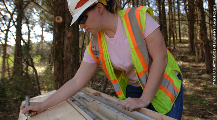 Geologist analyzes core samples at drill site, Baltimore, US